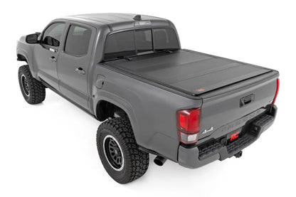 HARD TRI-FOLD FLIP UP BED COVER TOYOTA TACOMA 2WD/4WD (16-23)