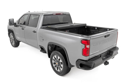 HARD TRI-FOLD FLIP UP BED COVER 6'9" BED | CHEVY/GMC 2500HD (20-25)