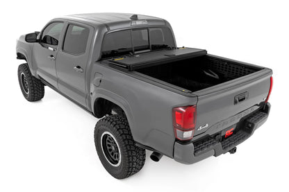 HARD TRI-FOLD FLIP UP BED COVER TOYOTA TACOMA 2WD/4WD (16-23)