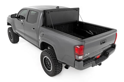 HARD TRI-FOLD FLIP UP BED COVER TOYOTA TACOMA 2WD/4WD (16-23)