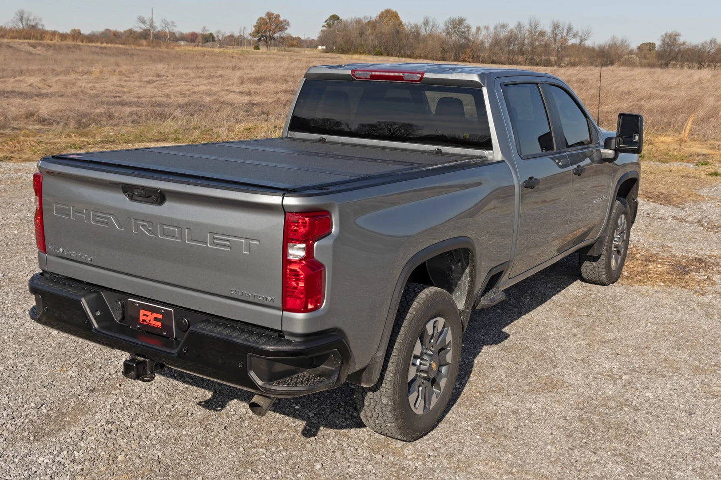 HARD TRI-FOLD FLIP UP BED COVER 6'9" BED | CHEVY/GMC 2500HD (20-25)